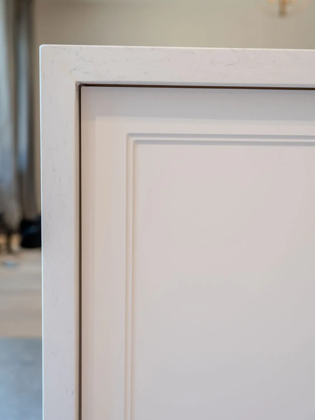 Samples of solid wood, MDF, and laminate kitchen cabinet materials, showcasing their textures and finishes