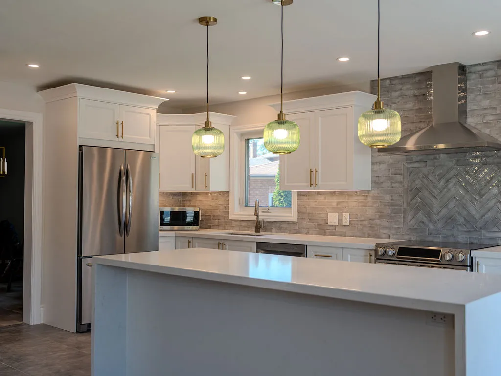 Contractor discussing kitchen renovation plans with homeowner