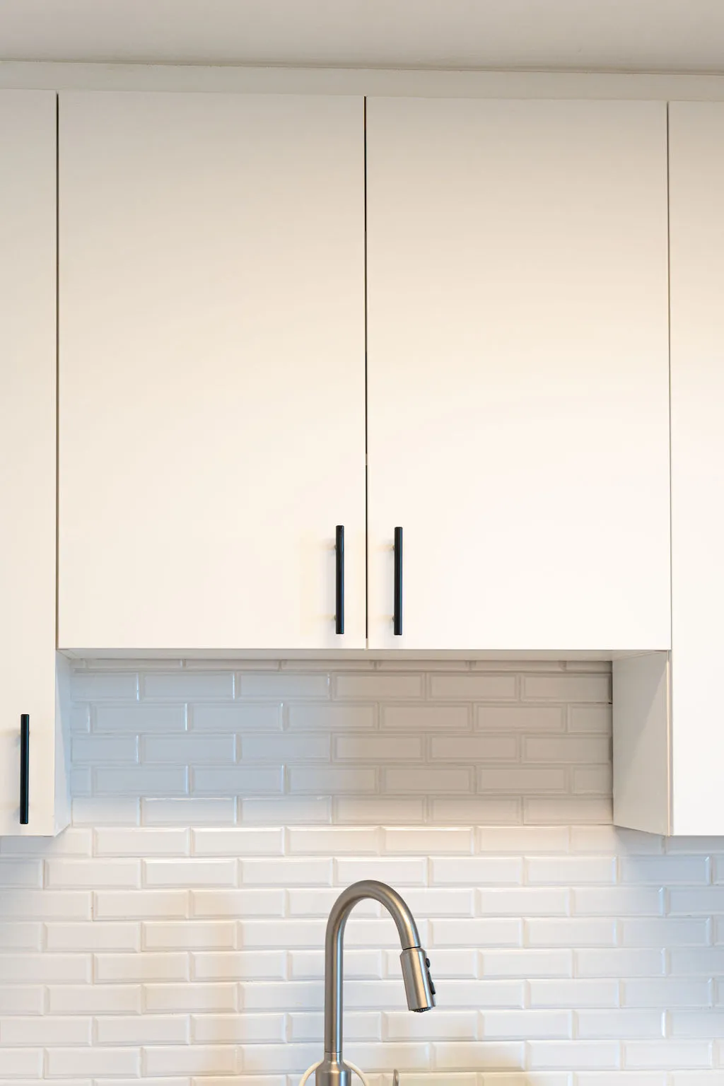 Display of solid wood, plywood, and MDF kitchen cabinet materials highlighting their textures and finishes