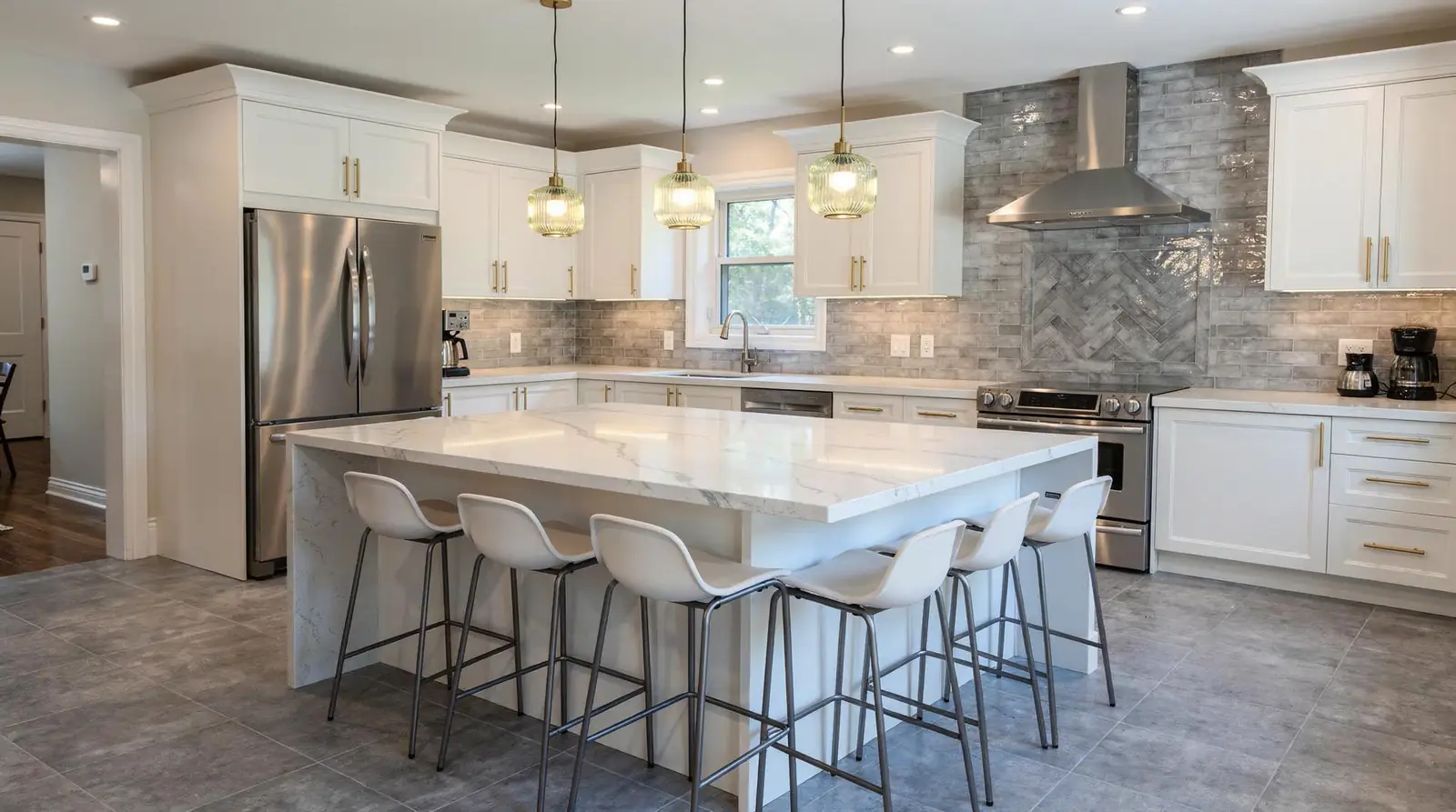 In a Highgate, London flat, the designer used a marble-topped kitchen island styled as